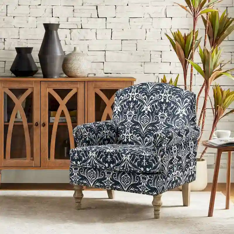 Fauteuil de ferme clouté avec accoudoirs roulés