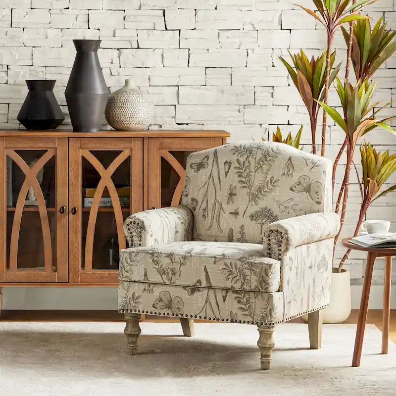 Fauteuil de ferme clouté avec accoudoirs roulés